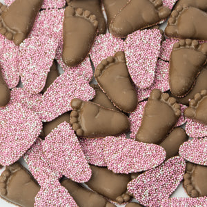 Babyvoetjes met roze musketzaad - Geboortesnoepjes.nl